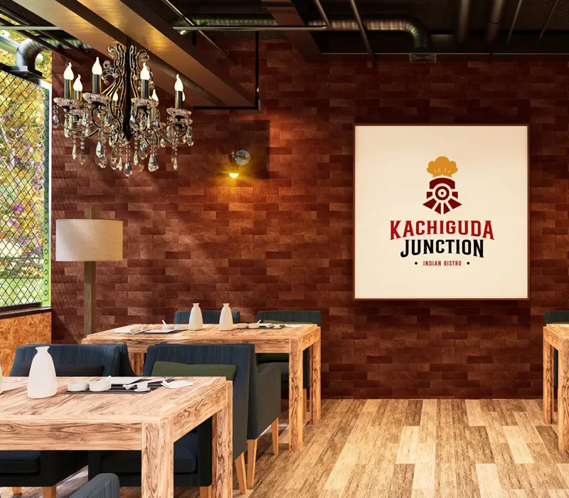 A chef tossing vegetables over an open flame in the Kachiguda Junction kitchen